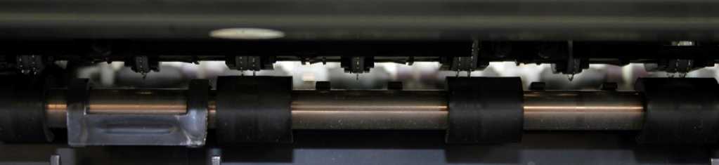Узловой фотоснимок участков контактирования металлических шестерней с эластичными валиками БПУ